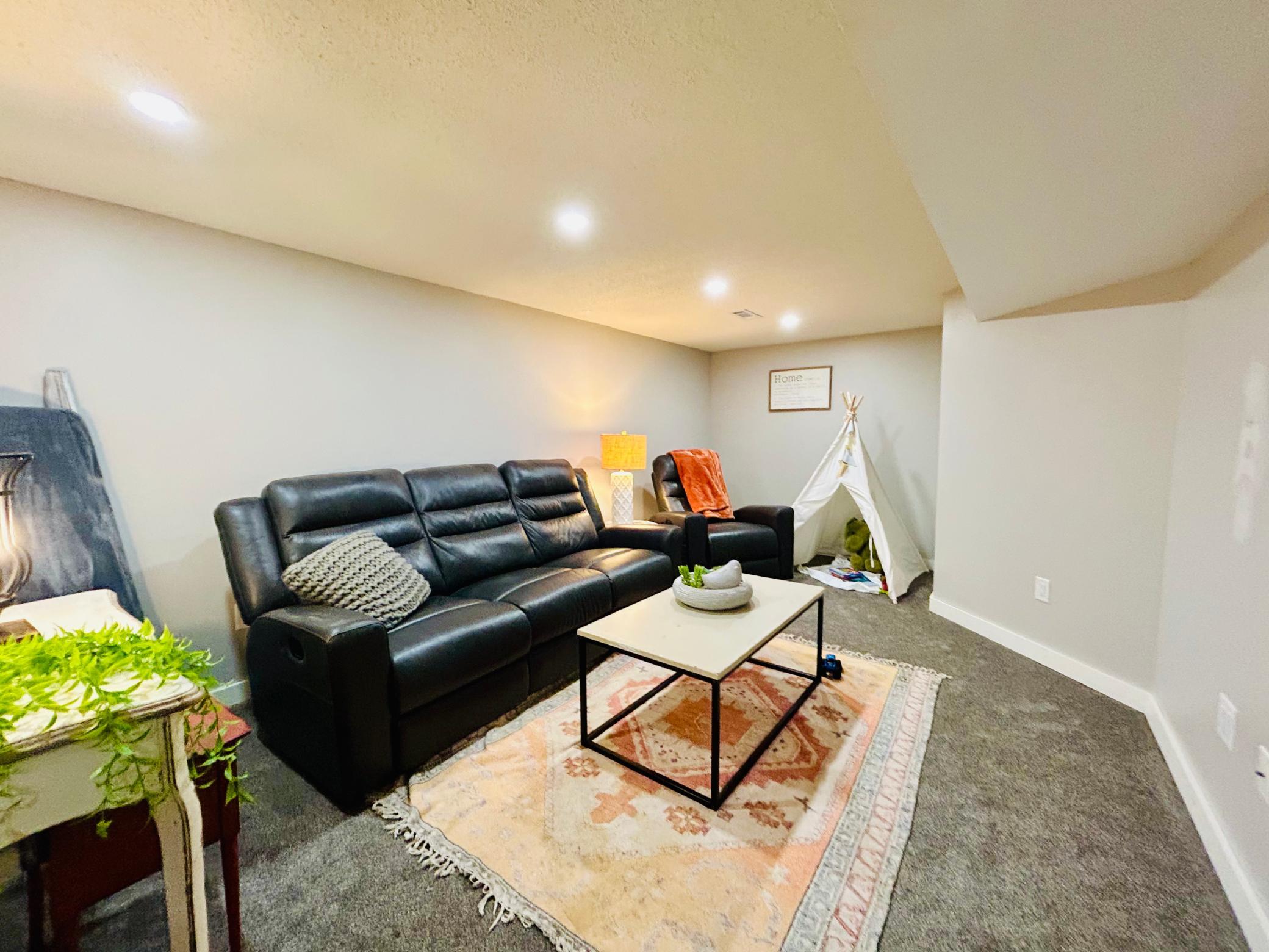 Great family room for movie night & hanging out! Recessed lighting and totally updated!