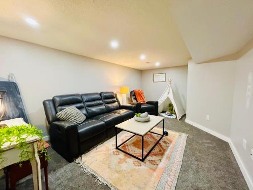 Great family room for movie night & hanging out! Recessed lighting and totally updated!