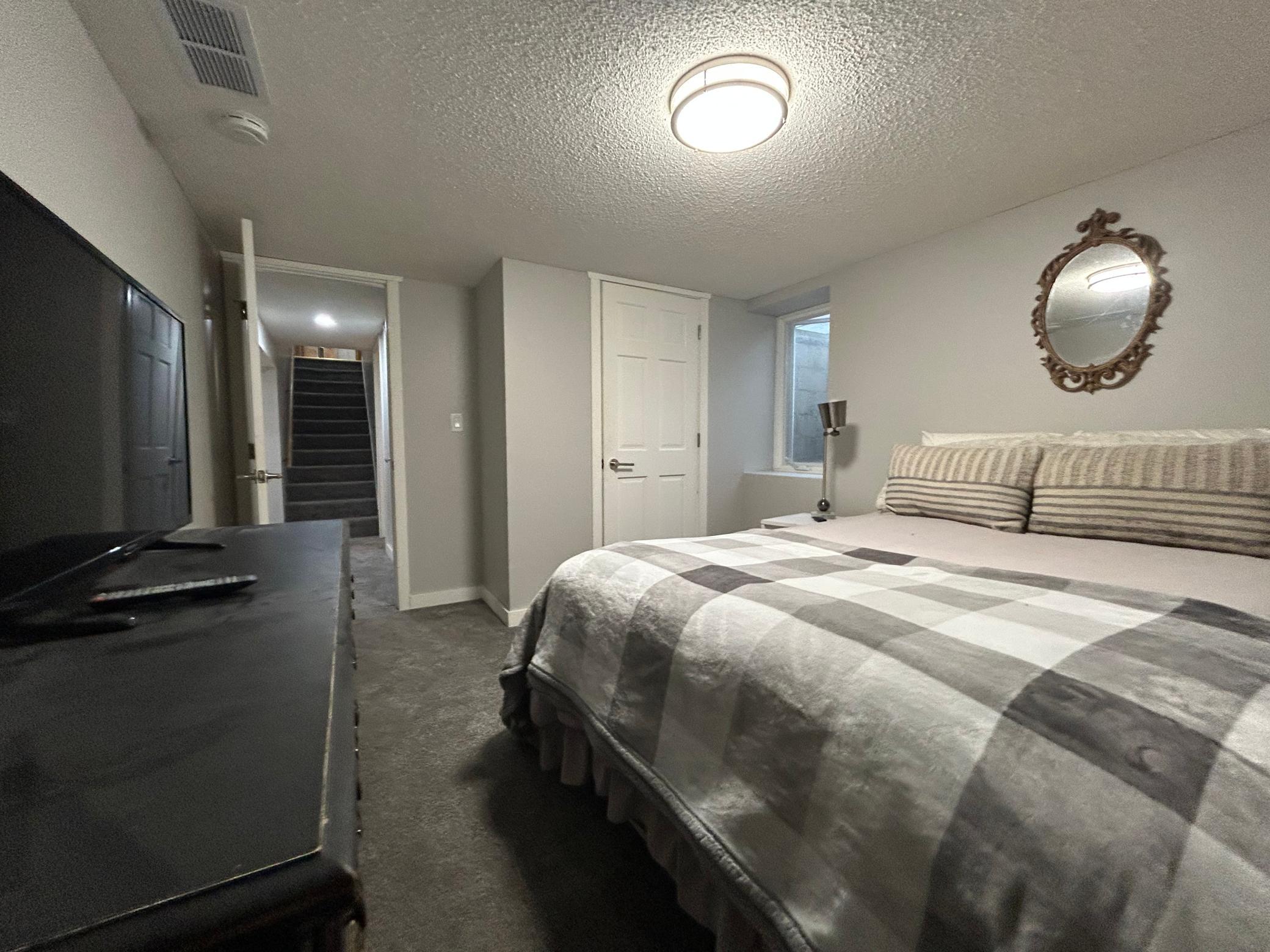 Bedroom 4 on the lower level is a great size, big closet and check the box for legal egress window