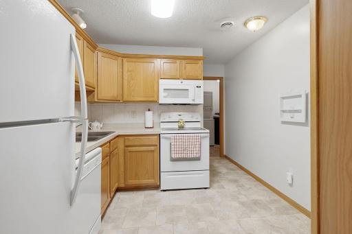Utility and laundry room behind the kitchen