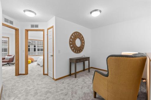 Rounding out the upper level is a versatile loft space, perfect for a home office, additional living area, or flex space.