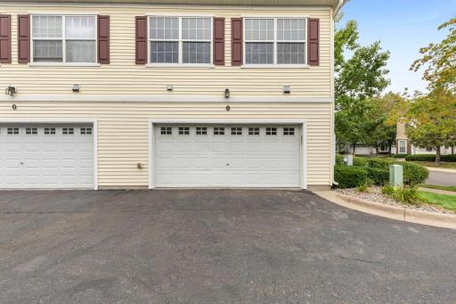 A view of the entrance to the attached 2-car garage.
