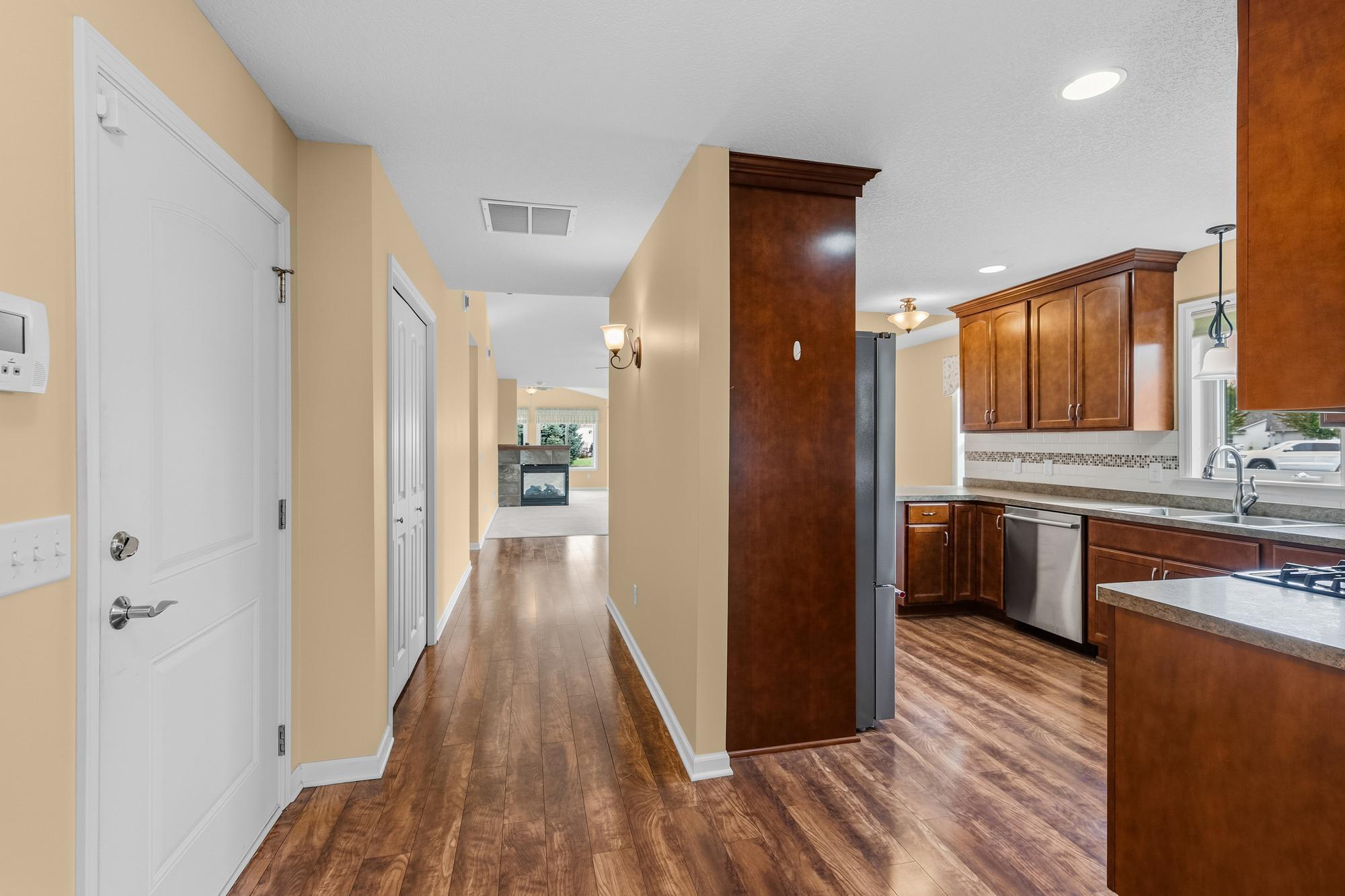 View from the foyer. Hall has a large coat closet.