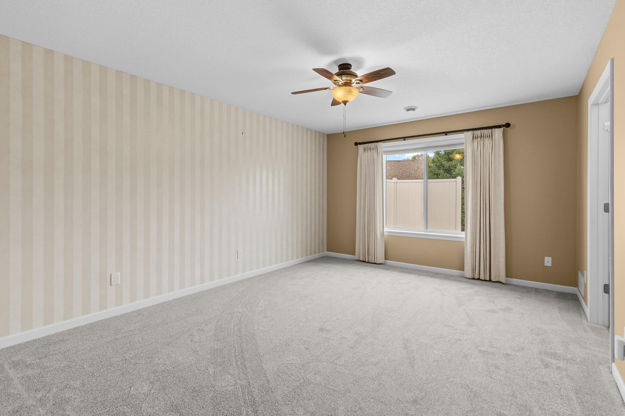 Primary Bedroom fits a king sized bed with ease