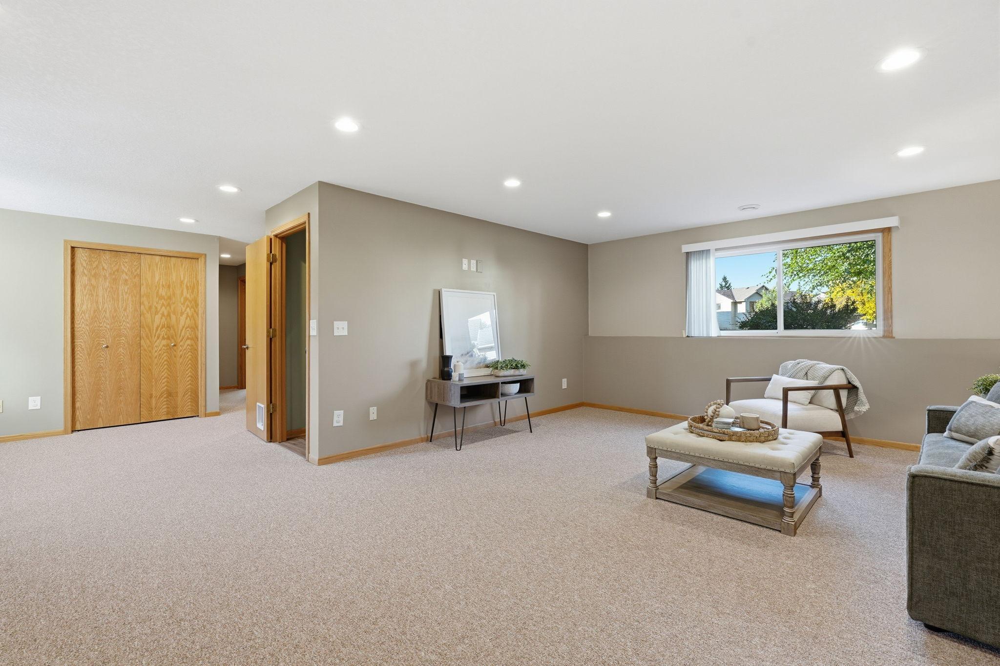 Lower level family room with tons of light and space