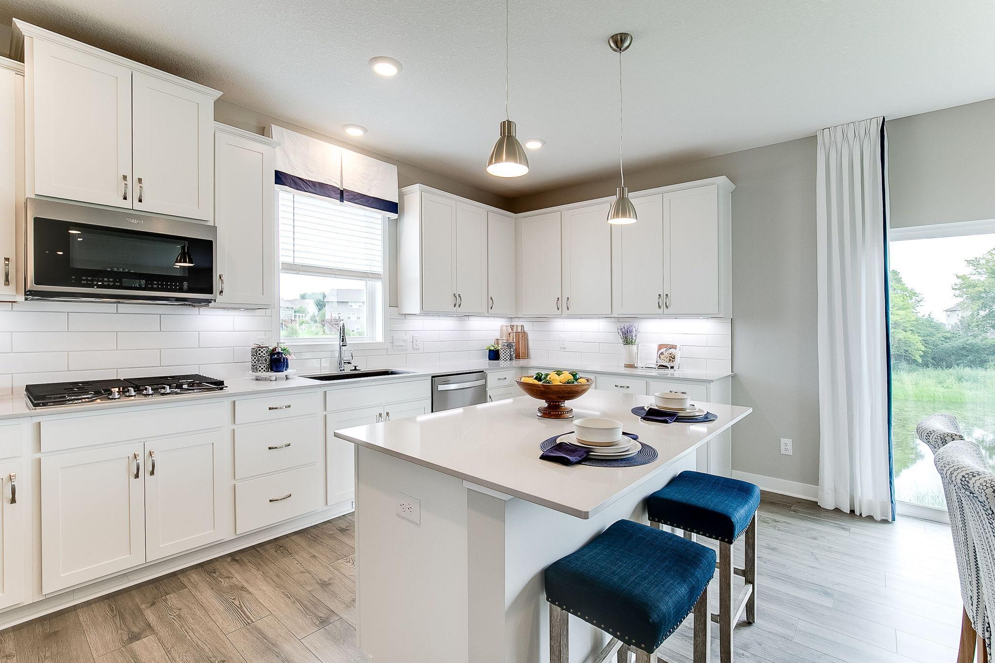 Welcome home! This stunning kitchen is sure to impress! *Picture is of model home; actual finishes may vary.