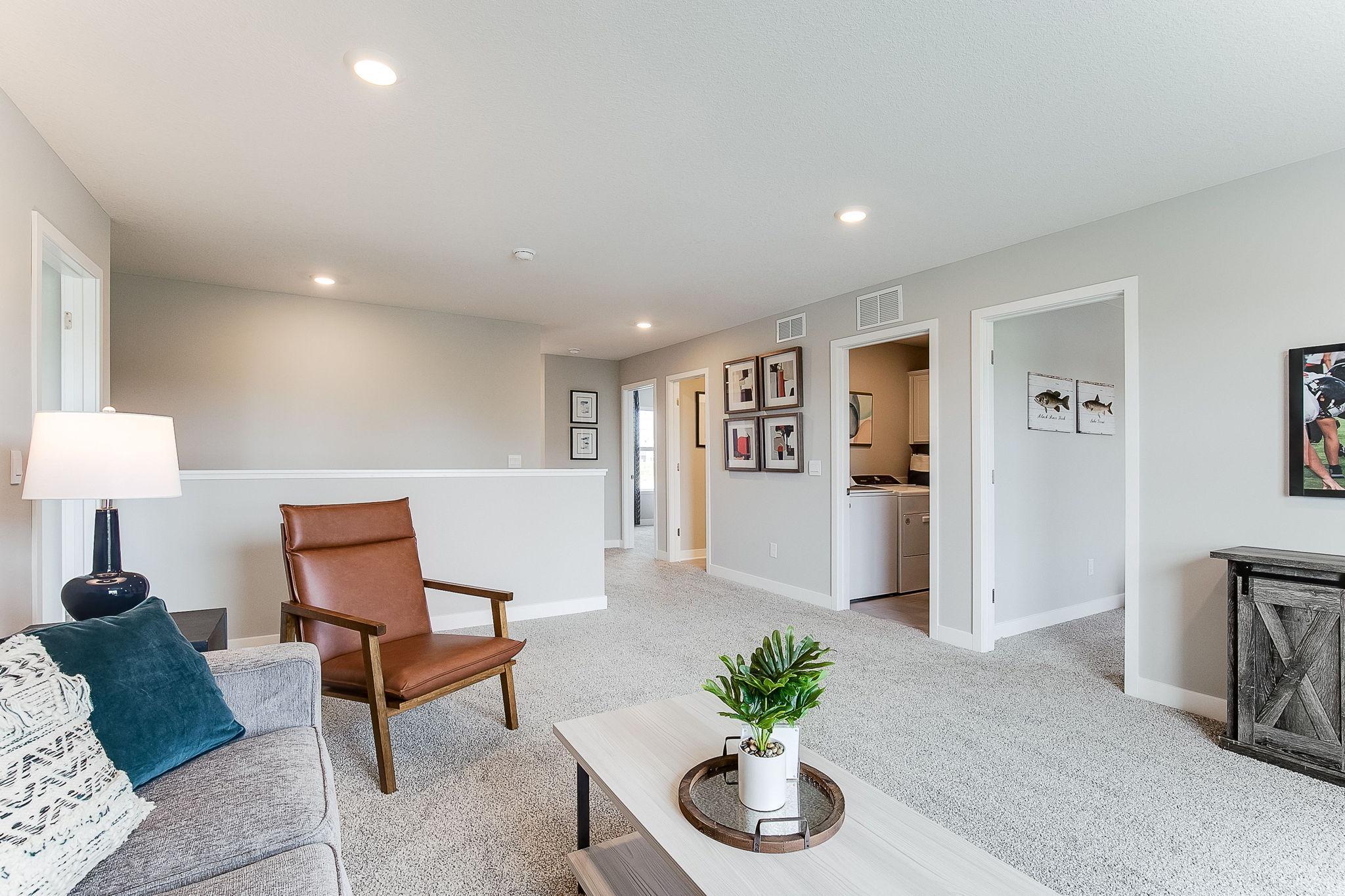 Relax in your spacious loft or turn it into a game room space! *Picture is of model home; actual finishes may vary.