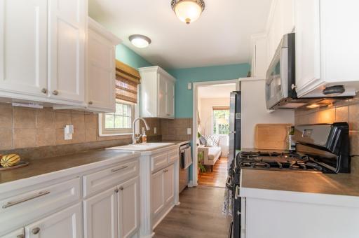 Loads of counterspace in this galley-style kitchen make great use of space to work in.