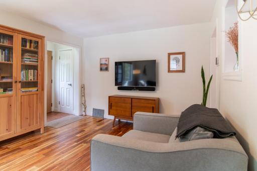 A spacious closet as well as shelving and hooks (not seen) opposite the closet provide plenty of storage in the entry.