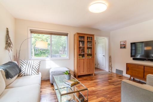 The front entryway is complete with ample storage for coats and gear and enters the home via the living room.