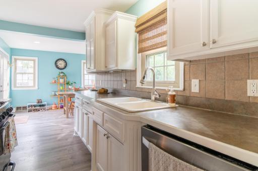 Complete with luxury vinyl flooring, the kitchen and dining area flow nicely and provide plenty of space for cooking and eating. South facing windows in the kitchen provide great lighting through the day and the seasons.