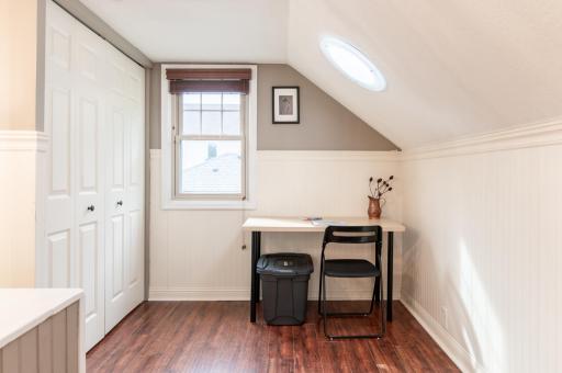 A large closet provides plenty of storage in the upper level.