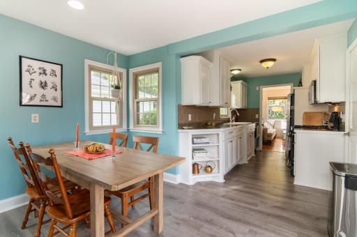 When the sun goes down, thoughtful in-ceiling lighting transforms this space into a cozy dining area.
