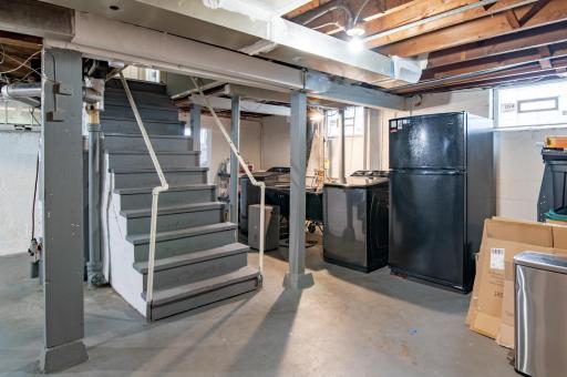 The unfinished basement provides over 600 feet of storage and workshop space in addition to the laundry.
