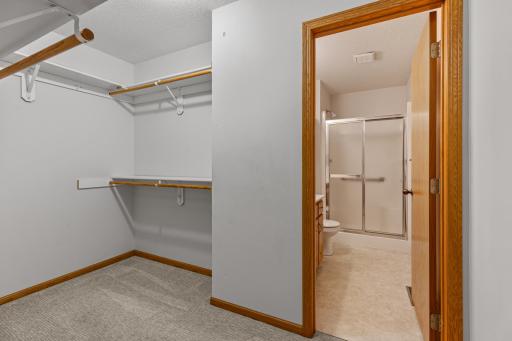 Primary walk-in closet and private 3/4 bath