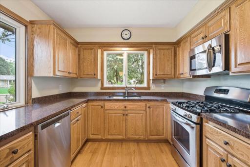 The kitchen is also filled with natural lighting and views out your windows.