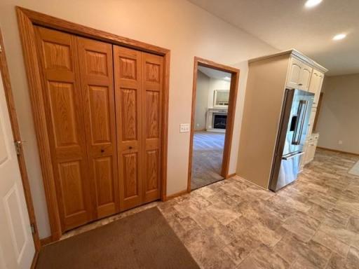 16 garage entry kitchen living room perspective.jpg