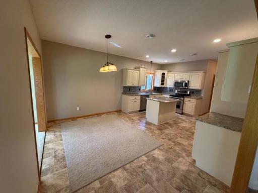 47 dining and kitchen area from living room.jpg