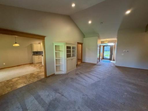 46 living dining front entry perspective.jpg
