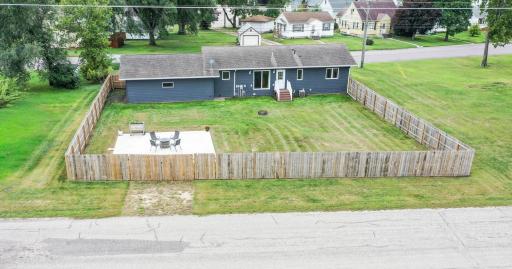 New Fence in backyard with patio area