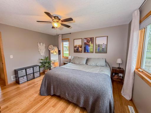 Primary Bedroom with walk in shower bathroom suite
