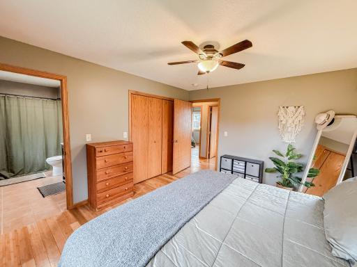 Primary Bedroom with walk in shower bathroom suite