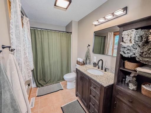 NEW walk in shower, vanity, in primary bedroom