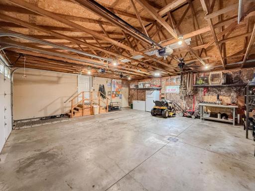 Insulated, floor drains, attached, back yard access