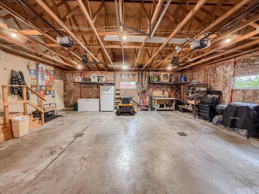Insulated, floor drains, attached, back yard access