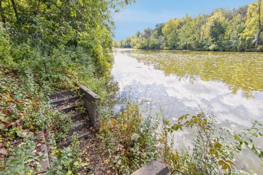 A tucked -away path and steps lead to the shores of Melody Lake