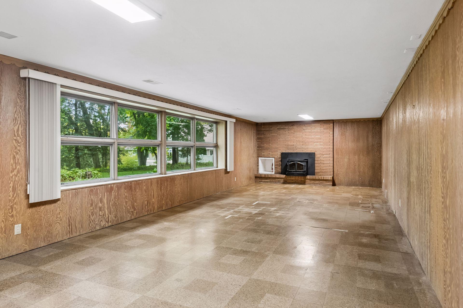 Walkout lower level offers plenty of space for entertaining, movie nights, games, and play.