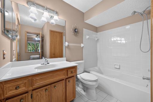 Both bedrooms have direct access to a bathroom. The second bathroom is a full bath, with skylight.