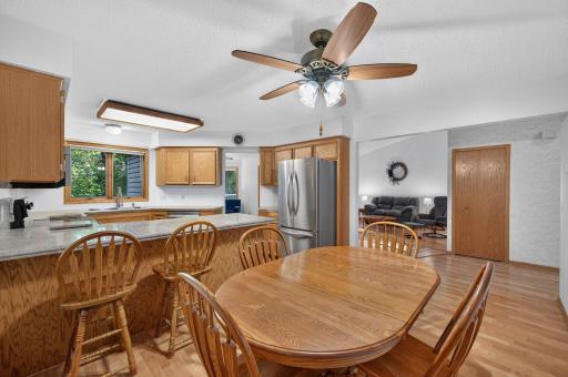 The kitchen features stainless steel appliances and beautiful countertops. The spacious living and dining areas create plenty of room to gather or just spread out.