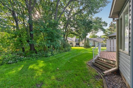 Experience the peace and serenity of one-level townhome living with nature views.