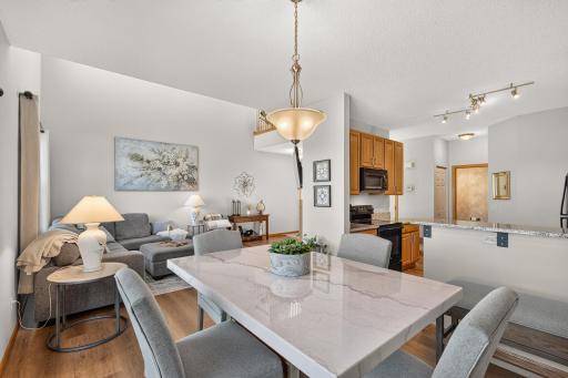 Large Dining space is ideally placed between the Kitchen and Living Room.