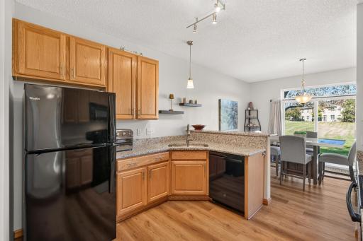 Easy care updated laminate flooring throughout the main level.