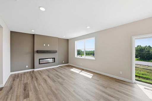 Living room - photos of a completed home of the same floorplan. Colors and selections may differ.
