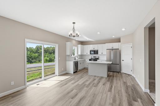 Kitchen/Dining - photos of a completed home of the same floorplan. Colors and selections may differ.