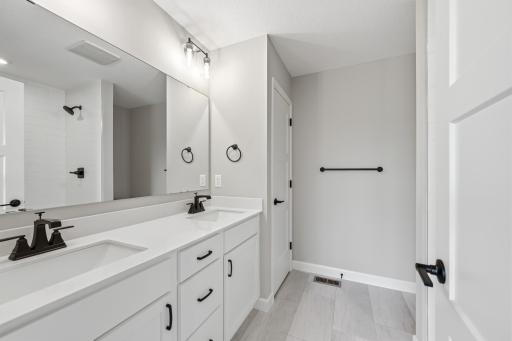 Primary suite - photos of a completed home of the same floorplan. Colors and selections may differ.