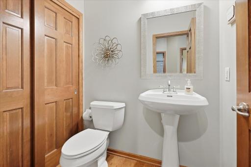 A main-level powder bath adds functionality and convenience for guests!