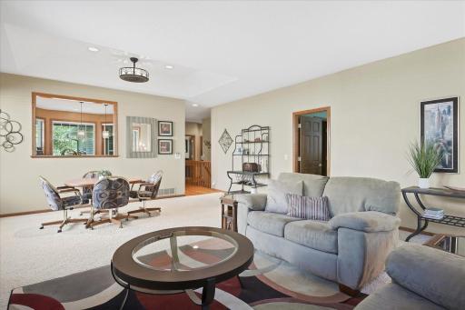 Sun-filled main level welcomes you with abundant natural light and an airy, inviting atmosphere!