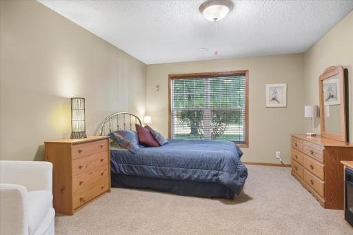 Comfortable lower-level bedroom with a walk-in closet perfect for guests!