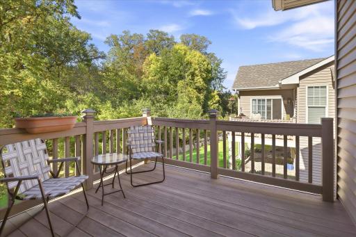Step from the four-season porch onto the maintenance-free deck for easy indoor-outdoor living!