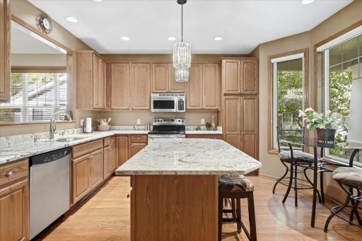 Spacious center island provides plenty of room for meal prep, casual dining, and entertaining!