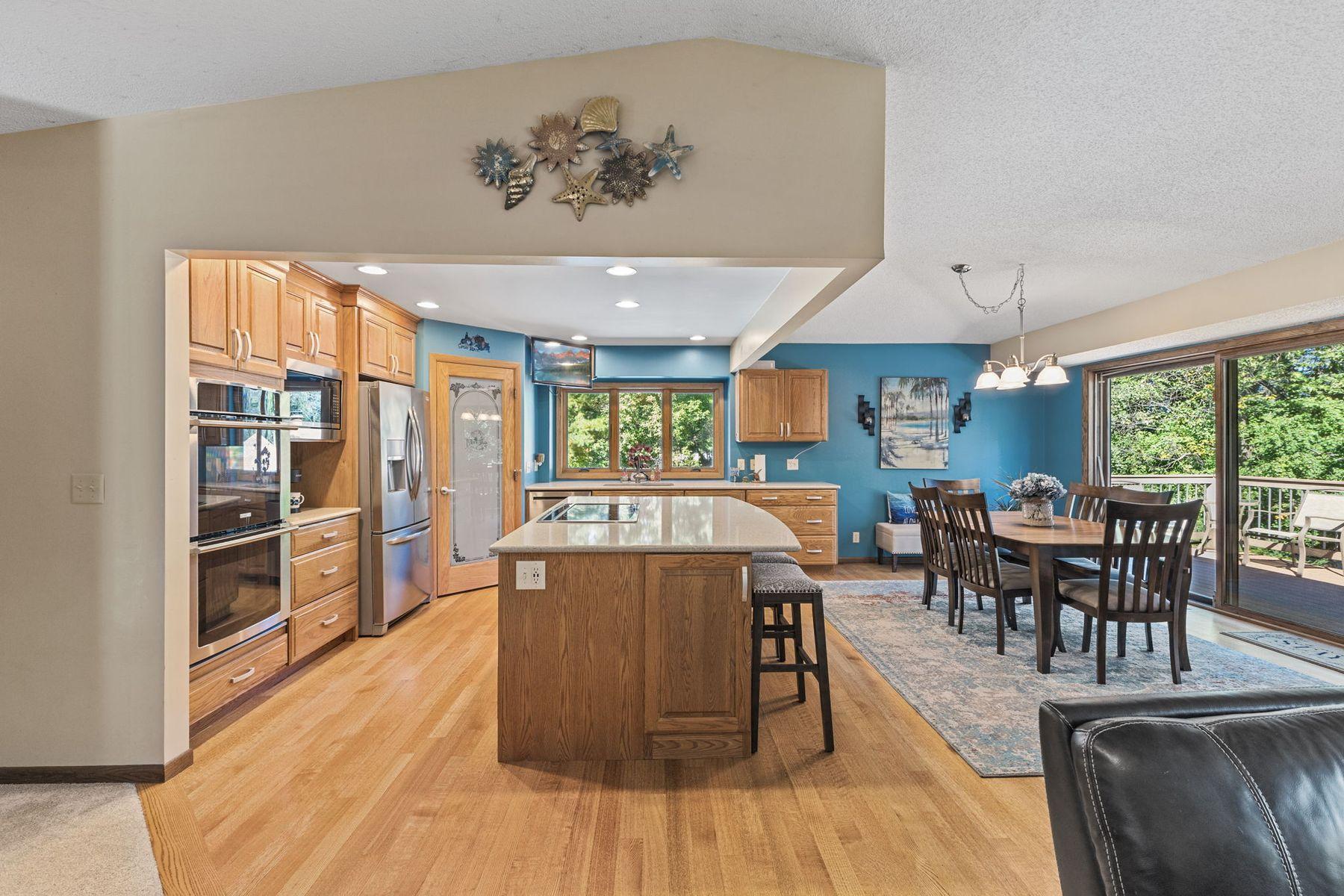 1615 Laurel Ave Kitchen island for an eat in kitchen and diningroom area with walkout to the maintenance free deck
