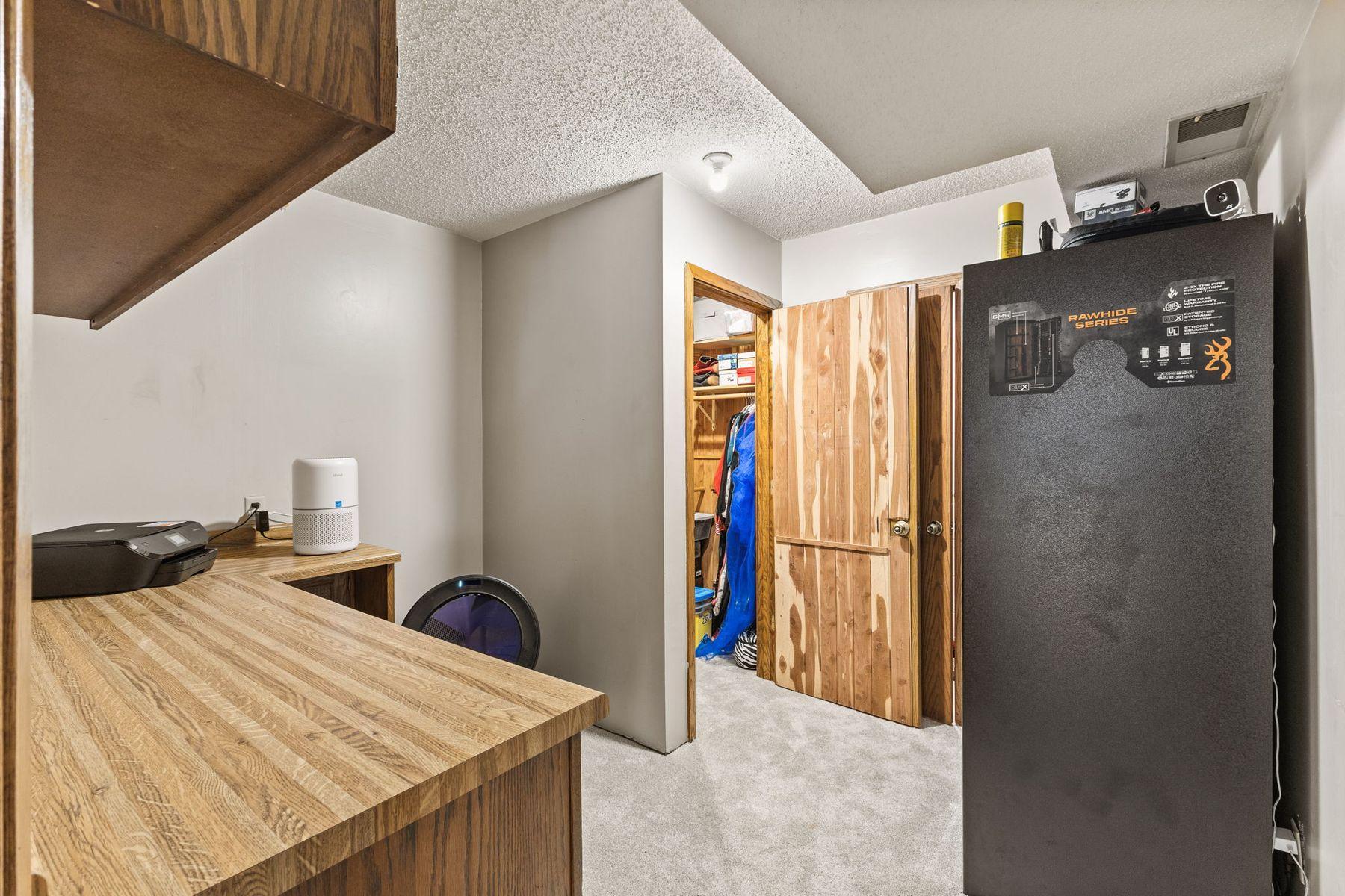 1615 Laurel Ave Lower Level Office with wine cellar, and cedar closet ready to be a sauna