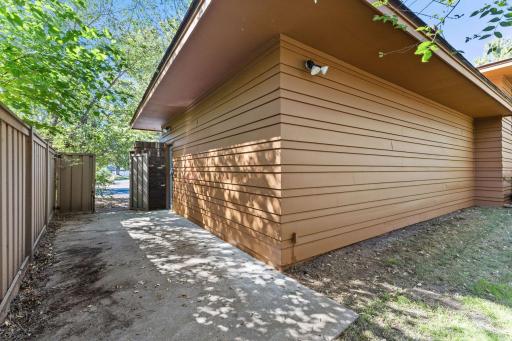 1615 Laurel Ave Storage area on the side of the garage with a double wide gate for easy access