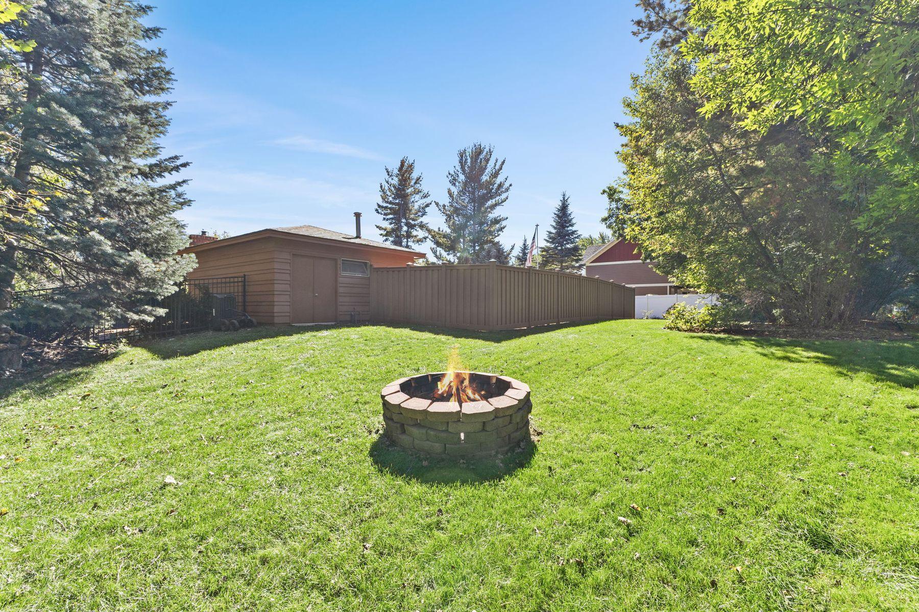 1615 Laurel Ave Fire Pit outside the gated fenced in back yard.area