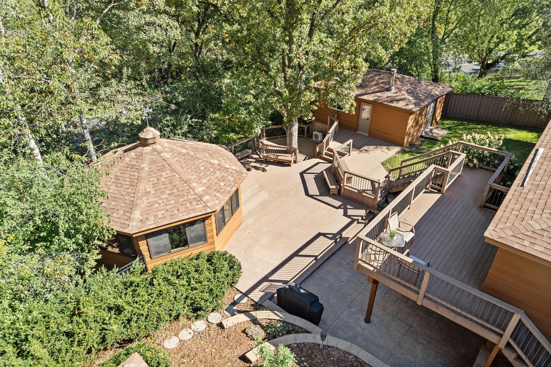 1615 Laurel Ave Gazebo with hot tub, 16X22 workshop, surrounded by maintenance free decking.
