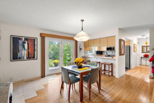 Dining room with doors to large deck and private rear yard